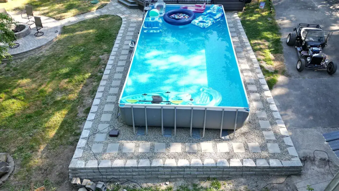 Paver pool surround in an Auburn backyard, seen from above