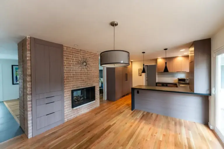 Open walnut kitchen and living room in Kent