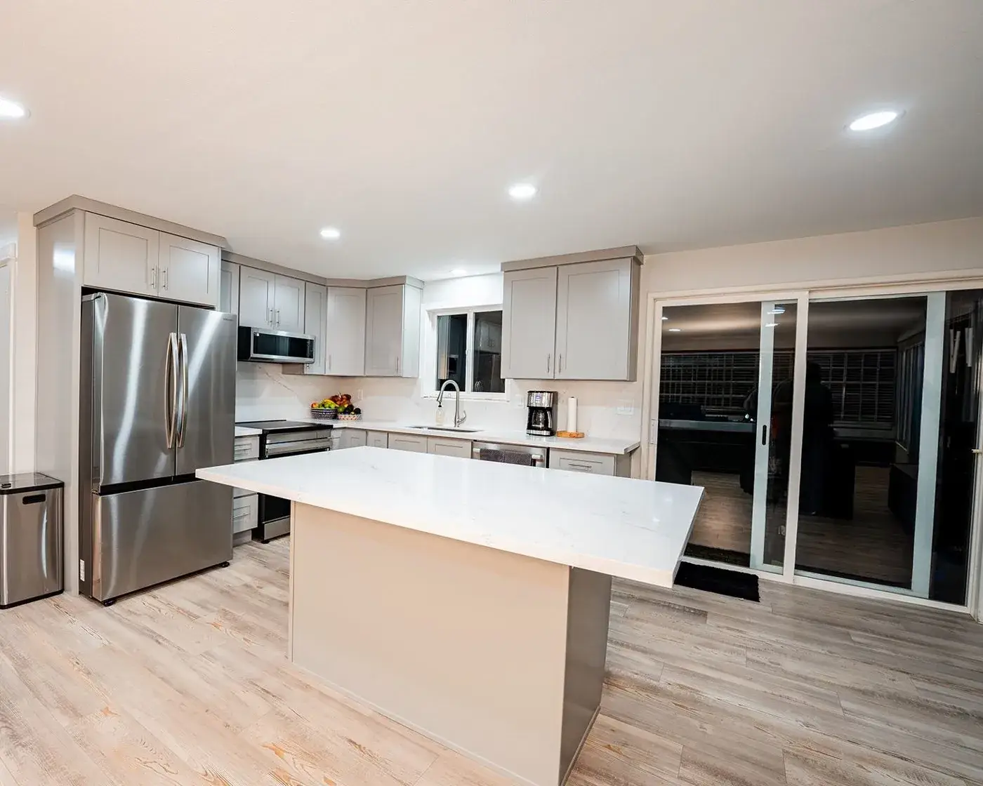 Bright Kirkland kitchen with a white island and stainless appliances