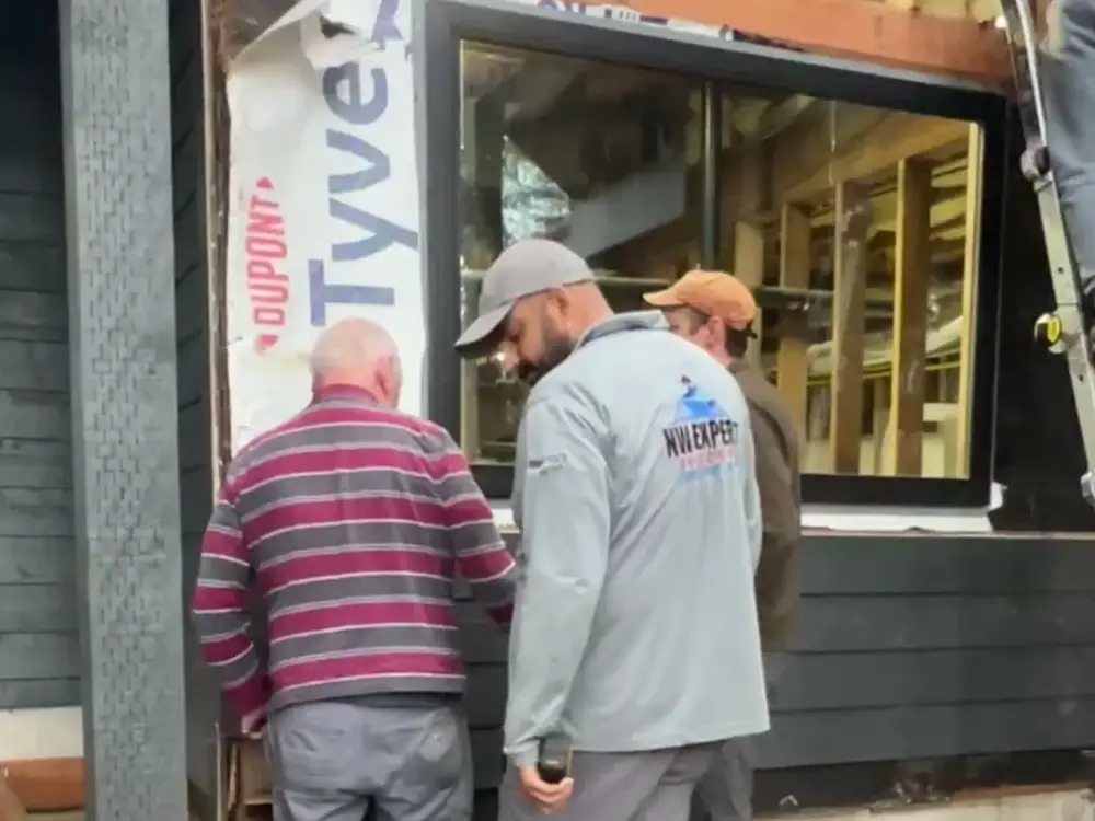 Our team with a homeowner, walking through his project at his home