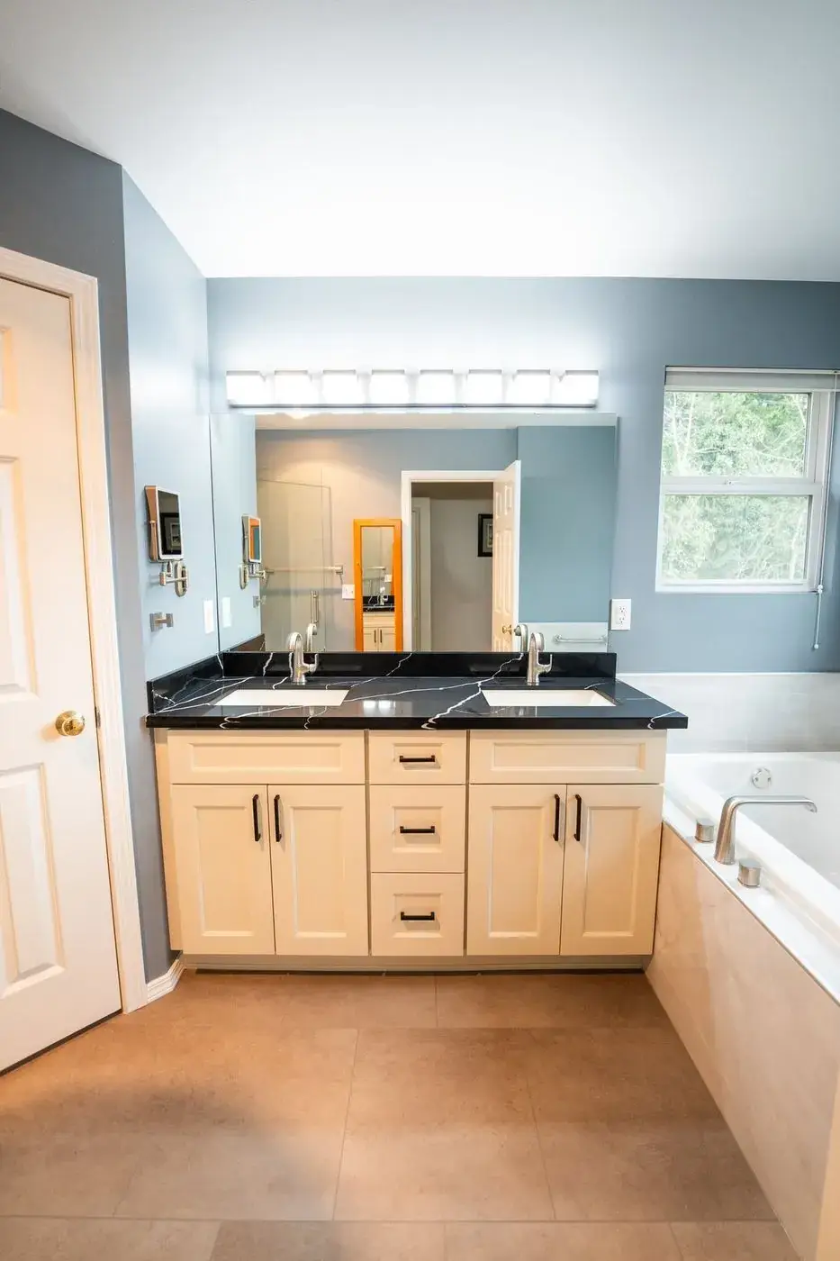 Double vanity in cream shaker with black veined quartz