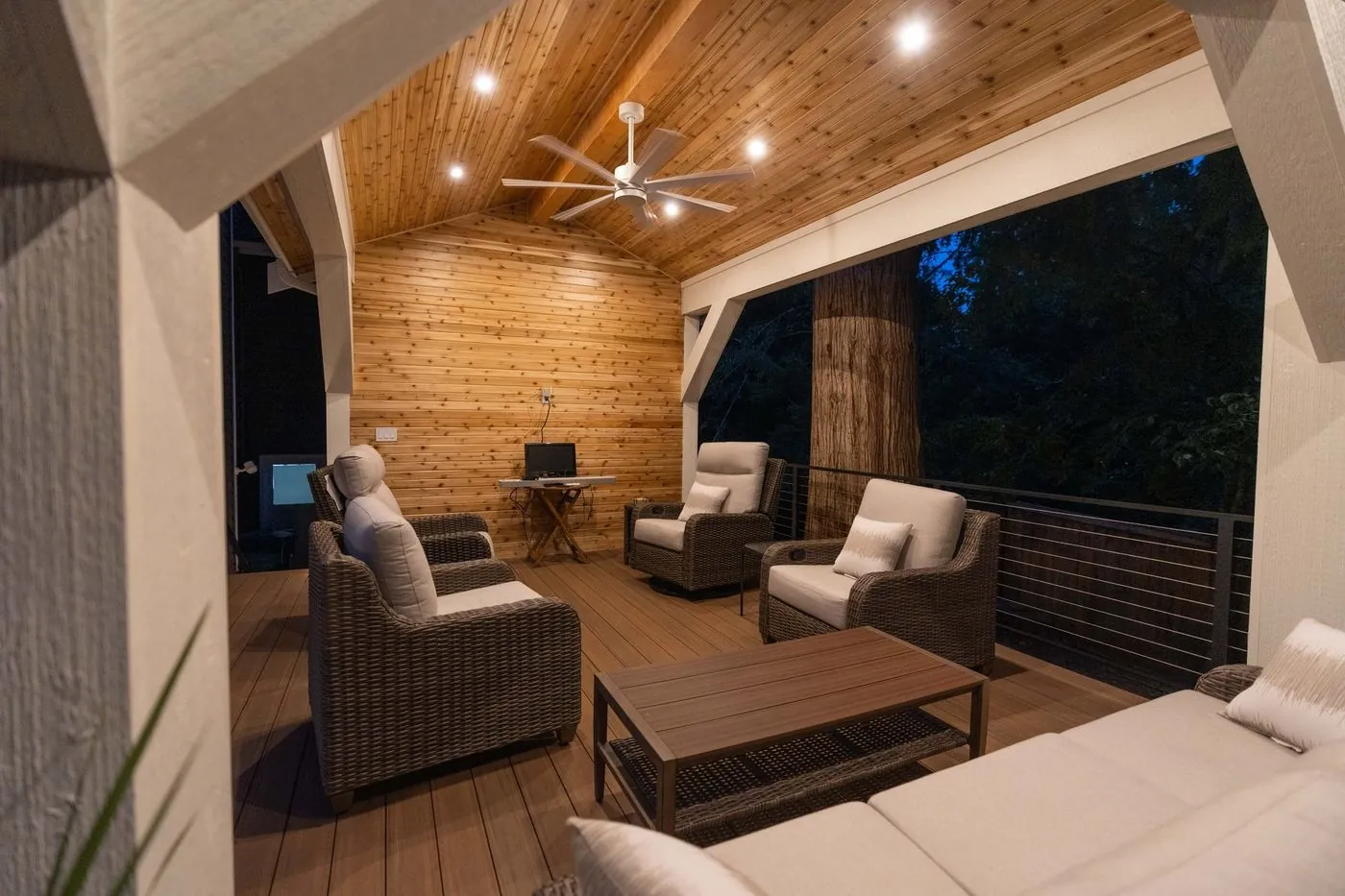 Outdoor living room under a cedar pavilion